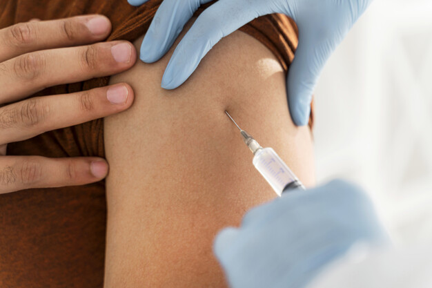https://www.freepik.com/free-photo/close-up-man-being-vaccinating-by-doctor_11175606.htm#page=2&query=covid+vaccinations&position=1