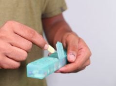 https://www.freepik.com/premium-photo/close-up-man-hand-taking-pills-from-pill-box_10552151.htm#page=1&query=taking%20medication&position=46