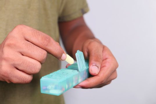https://www.freepik.com/premium-photo/close-up-man-hand-taking-pills-from-pill-box_10552151.htm#page=1&query=taking%20medication&position=46