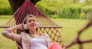 https://www.freepik.com/free-photo/close-up-portrait-woman-lying-down-hammock-listening-music-with-cell-phone-cheerful-girl-enjoy-red-hammock-outdoor-woman-relaxing-outside-listening-music-with-earphones_1191690.htm#page=2&query=backyard+enjoyment&position=3