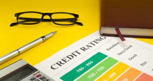 https://www.freepik.com/premium-photo/credit-rating-yellow-table-pen-glasses-notebook-calculator_8416884.htm#page=1&query=credit+score&position=30