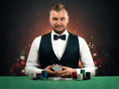 https://www.freepik.com/premium-photo/croupier-man-sits-table-with-chips-playing-cards_11478089.htm