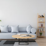 grey-sofa-pillow-white-living-room_43614-98