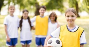 https://www.freepik.com/premium-photo/little-girl-holding-football-her-team-mates_9514034.htm#page=5&query=kid+sports&position=29