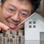 model-houses-stacked-coins-home-equity-loans-mortgages-loans_127345-740