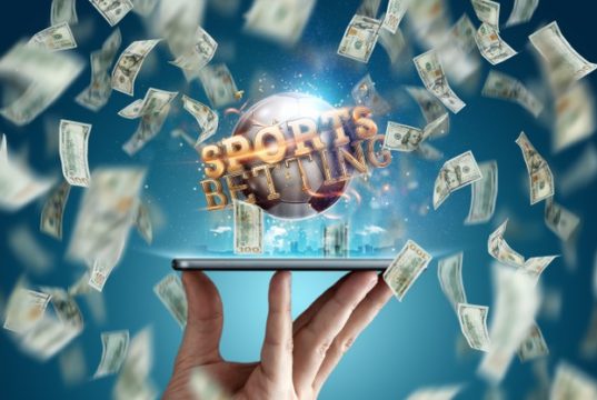 https://www.freepik.com/premium-photo/online-sports-betting-dollars-are-falling-background-hand-with-smartphone-soccer-ball-creative-background-gambling_12619648.htm