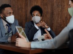 https://www.pexels.com/photo/business-people-wearing-face-masks-and-talking-4427957/