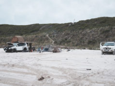 https://www.pexels.com/photo/suv-cars-parked-on-sandy-coast-against-overcast-sky-6510413/