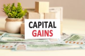 https://www.freepik.com/premium-photo/white-paper-card-with-text-capital-gains-background-paper-money-business-concept_13504938.htm#page=1&query=capital%20gains&position=6