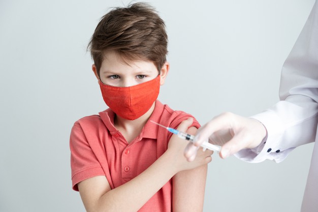 child-medical-mask-is-vaccinated-against-coronavirus-covid-pandemic_95685-972 https://www.freepik.com/premium-photo/child-medical-mask-is-vaccinated-against-coronavirus-covid-pandemic_14280990.htm?query=covid%20children%20vaccine