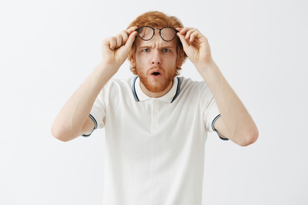 https://www.freepik.com/free-photo/confused-bearded-redhead-guy-posing-against-white-wall-with-glasses_11104179.htm#page=1&query=squinting&position=33