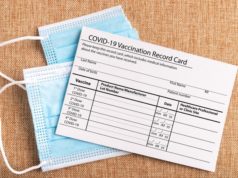 https://www.freepik.com/premium-photo/coronavirus-vaccination-record-card-surgical-mask-divided-into-two-parts-syringe-concept-defeating-covid19_13847894.htm#page=1&query=vaccine%20cards&position=11
