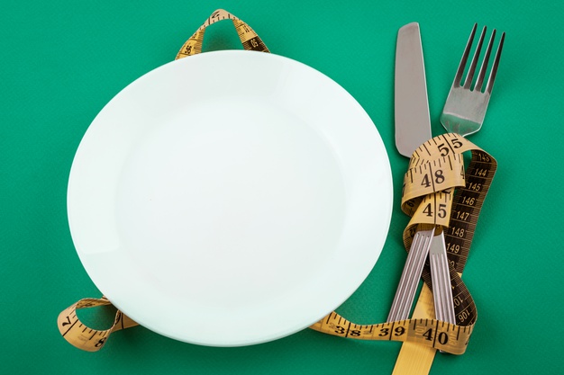 https://www.freepik.com/free-photo/empty-white-plate-with-measuring-tape-weight-loss-concept_10450704.htm