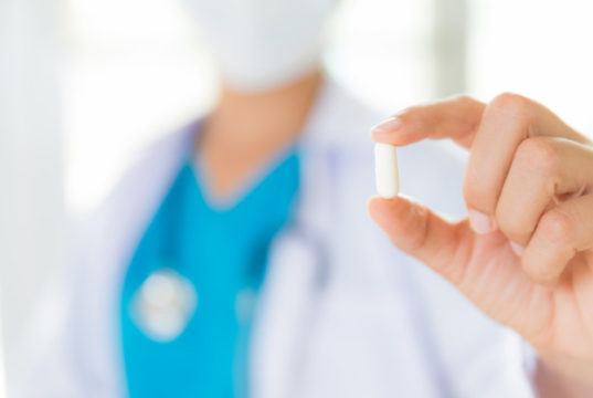 https://www.freepik.com/premium-photo/female-doctor-with-stethoscope-one-shoulder-holding-pill_2983157.htm#page=1&query=closeup%20hand%20one%20pill&position=23