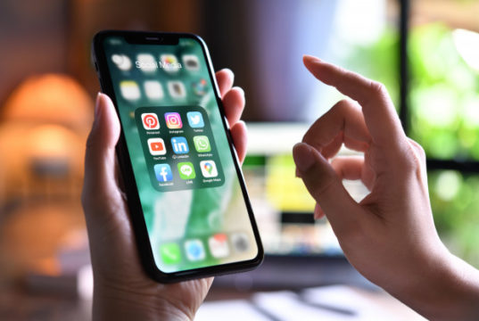 https://www.freepik.com/premium-photo/female-holding-smartphone-with-icons-social-media-screen-home_7704844.htm