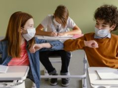 https://www.freepik.com/free-photo/front-view-children-with-medical-masks-doing-elbow-salute-class_12367048.htm