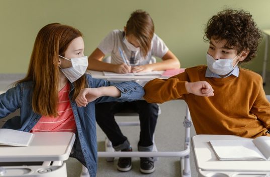 https://www.freepik.com/free-photo/front-view-children-with-medical-masks-doing-elbow-salute-class_12367048.htm