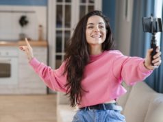 https://www.freepik.com/free-photo/happy-young-blogger-using-selfie-stick-talking-phone_8355167.htm#page=1&query=vlogging&position=20