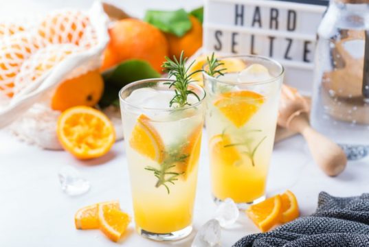 https://www.freepik.com/premium-photo/hard-seltzer-cocktail-with-orange-rosemary-ice-table-summer-refreshing-beverage-drink-white-table_13162314.htm#page=1&query=hard%20seltzer&position=46