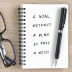 motivational handwriting on a notebook