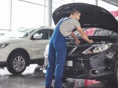https://www.freepik.com/free-photo/muscular-car-service-worker-repairing-vehicle_10519442.htm