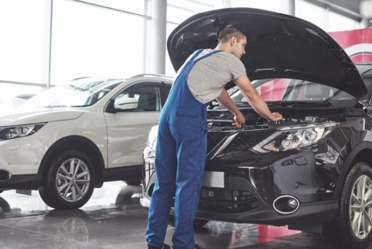https://www.freepik.com/free-photo/muscular-car-service-worker-repairing-vehicle_10519442.htm
