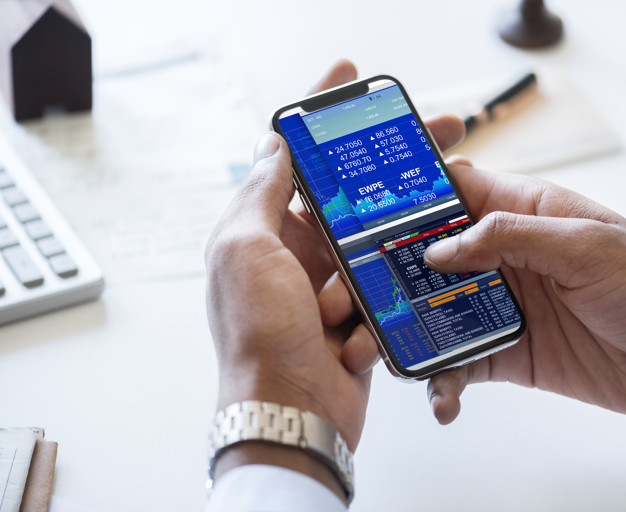 Businessman checking stock market online https://www.freepik.com/free-photo/businessman-checking-stock-market-online_2767747.htm#page=3&query=investments&position=27