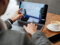 https://www.freepik.com/free-photo/cropped-image-businessman-sitting-by-table-cafe-analyzing-indicators-laptop-computer_6876011.htm#page=1&query=stock%20market&position=10