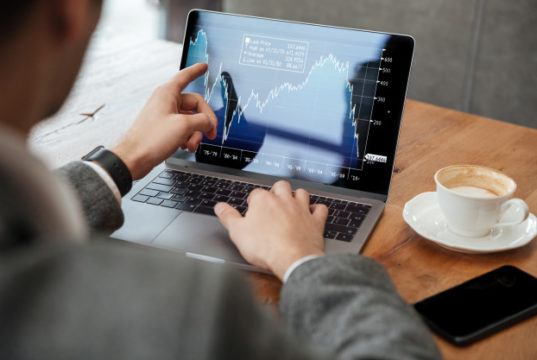 https://www.freepik.com/free-photo/cropped-image-businessman-sitting-by-table-cafe-analyzing-indicators-laptop-computer_6876011.htm#page=1&query=stock%20market&position=10