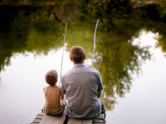 https://www.freepik.com/premium-photo/dad-son-fishing-lake_8443165.htm