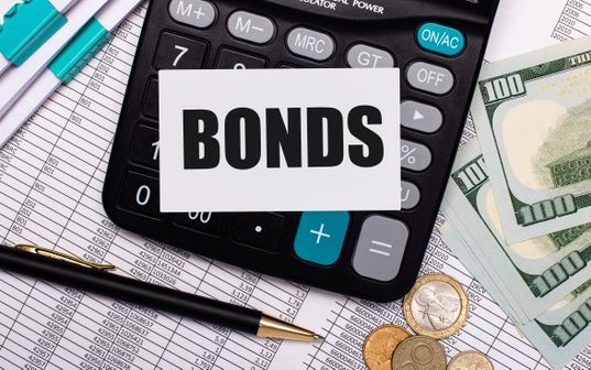 https://www.freepik.com/premium-photo/desktop-are-reports-pen-cash-calculator-card-with-text-bonds_13979949.htm#page=2&query=bond+market&position=26
