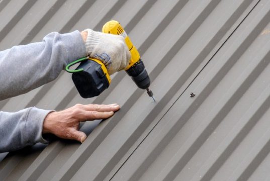 https://www.freepik.com/premium-photo/male-hands-gloves-with-screwdriver-screw-roofing-sheet-roof_14700689.htm?query=metal%20roof