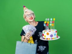 https://www.freepik.com/free-photo/smiling-young-blonde-party-woman-wearing-glasses-birthday-cap-holding-birthday-cake-with-stars-money-gift-box-paper-bag-looking-side-isolated-green-wall-with-copy-space_13954595.htm?query=party