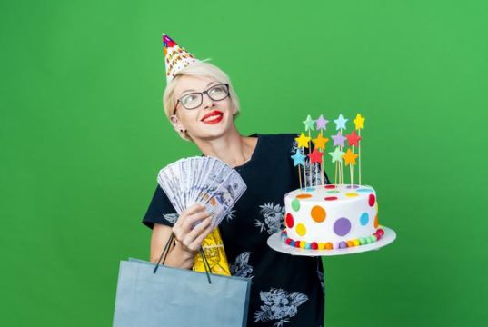 https://www.freepik.com/free-photo/smiling-young-blonde-party-woman-wearing-glasses-birthday-cap-holding-birthday-cake-with-stars-money-gift-box-paper-bag-looking-side-isolated-green-wall-with-copy-space_13954595.htm?query=party