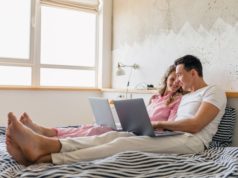 https://www.freepik.com/free-photo/young-couple-sitting-bed-morning-man-woman-working-laptop_13977567.htm#page=2&query=laptop+bed&position=10