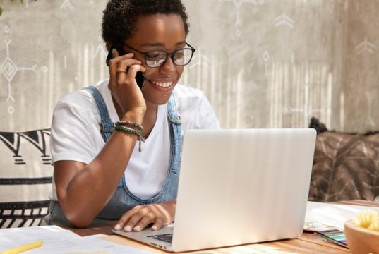 https://www.freepik.com/free-photo/stylish-african-american-woman-calls-smart-phone-looks-laptop-computer-updates-software_13760565.htm#page=1&query=women%20entrepreneurs&position=4