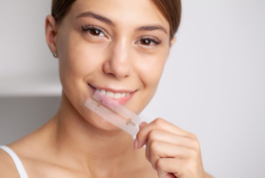 https://www.freepik.com/premium-photo/teeth-whitening-beautiful-smiling-woman-holding-whitening-strip_13529284.htm#page=1&query=teeth%20whitening%20strips&position=1