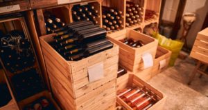 https://www.freepik.com/premium-photo/wine-cellar-with-glass-bottles-alcoholic-drink-wooden-boxes-wine-racks-with-vintage-year-labels_15724859.htm?query=wine%20store