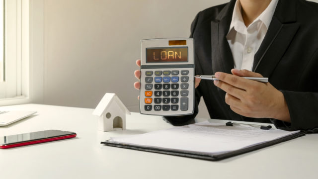 https://www.freepik.com/premium-photo/businesswoman-holding-calculator-pointing-pen-loan-text-sme-loan-concept-calculator_17384838.htm?query=home%20mortgage