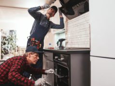 https://www.freepik.com/premium-photo/collaboration-work-photo-two-mechanics-working-kitchen_16471403.htm?query=stove%20repair