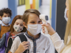 https://www.freepik.com/free-photo/female-teacher-with-medical-mask-checking-student-s-temperature-school_12367082.htm#page=2&query=covid%20school&position=43