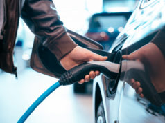 https://www.freepik.com/free-photo/human-hand-is-holding-electric-car-charging-connect-electric-car_8069535.htm#page=1&query=electric%20vehicles&position=11