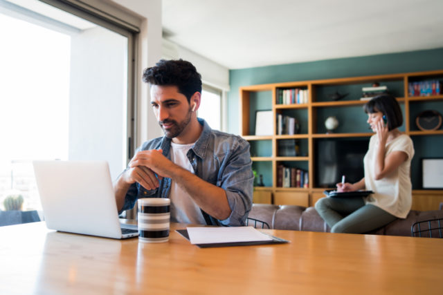 https://www.freepik.com/free-photo/portrait-young-man-working-with-laptop-from-home-while-woman-talking-phone_13907446.htm#page=2&query=work%20from%20home&position=43