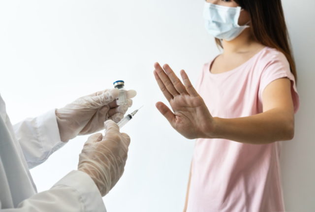 https://www.freepik.com/premium-photo/woman-wearing-surgical-mask-refuse-injection-vaccination-rejection-vaccine-concept_16222210.htm#page=1&query=vaccine%20refusal&position=42