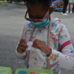 A – Lighthouse client Ma’Leach decorating a pencil case