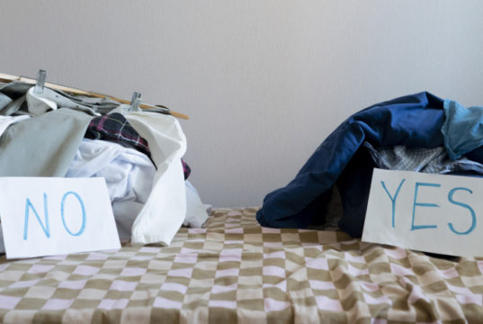 https://www.freepik.com/premium-photo/cleaning-sorting-clothes-two-heap-textile-choose-yes-no_15324174.htm#page=1&query=purging%20closet&position=4