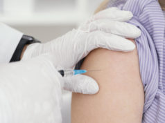 https://www.freepik.com/free-photo/doctor-vaccinating-patient-clinic_13436562.htm#page=2&query=covid+vaccination&position=25