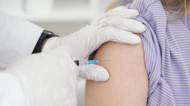 https://www.freepik.com/free-photo/doctor-vaccinating-patient-clinic_13436562.htm#page=2&query=covid+vaccination&position=25