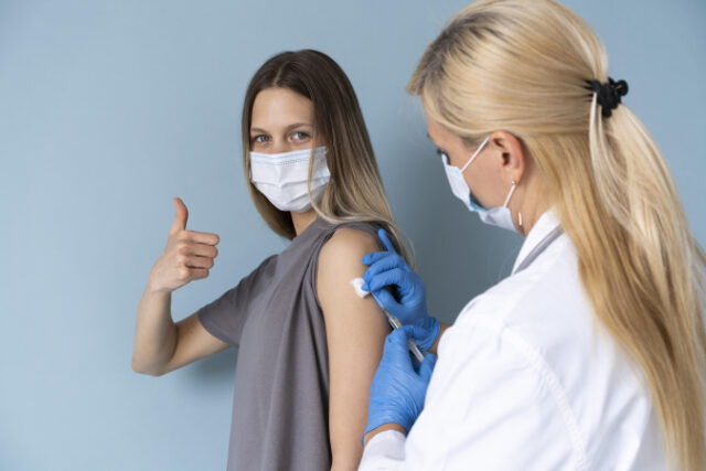 female-patient-with-medical-mask-getting-vaccine https://www.freepik.com/free-photo/female-patient-with-medical-mask-getting-vaccine_15595272.htm#page=1&query=covid%20shots&position=28