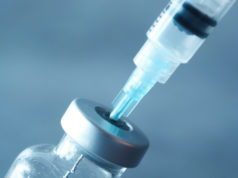 https://www.freepik.com/premium-photo/glass-vial-syringe-black-background_11946836.htm